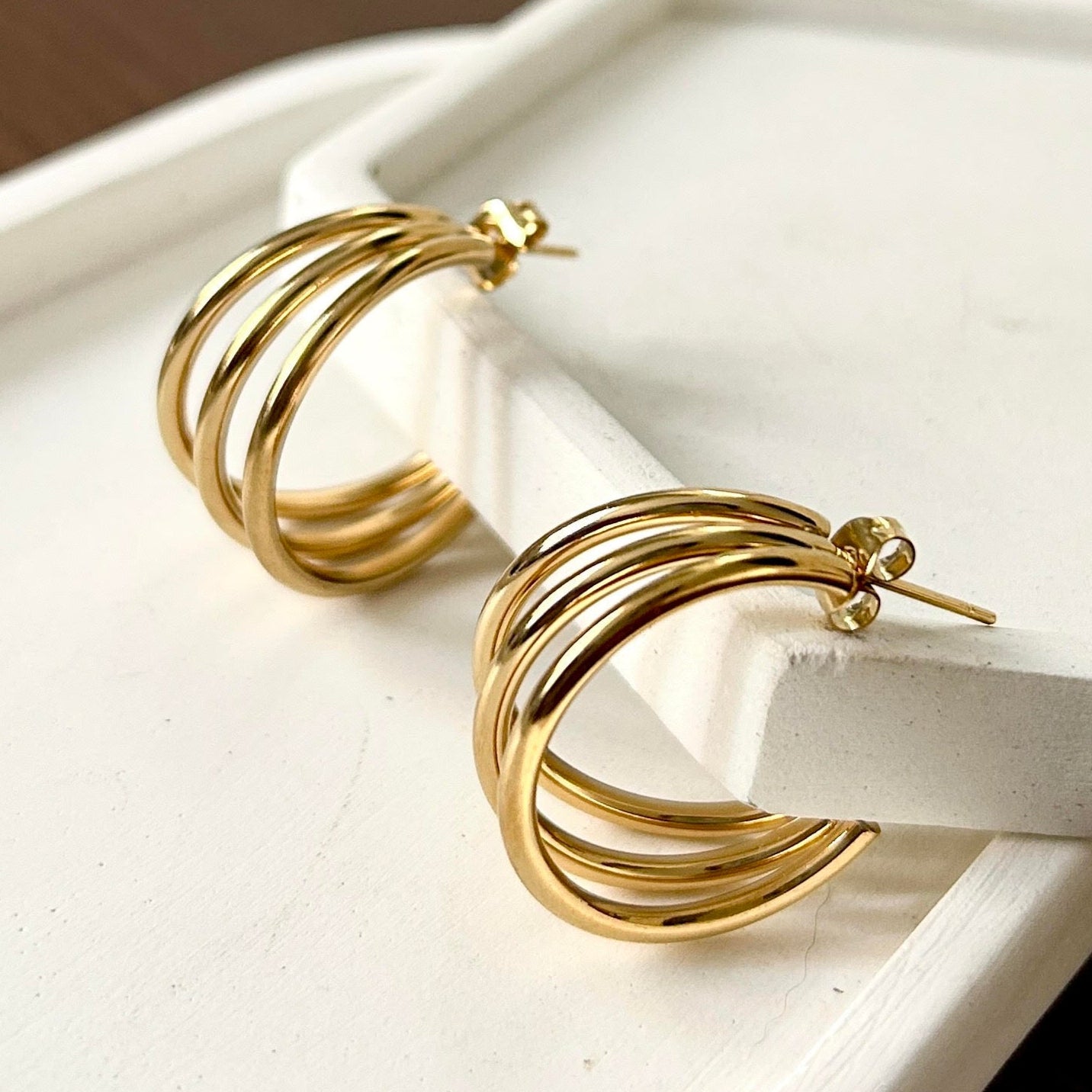 Argollas Strips en Acero Dorado