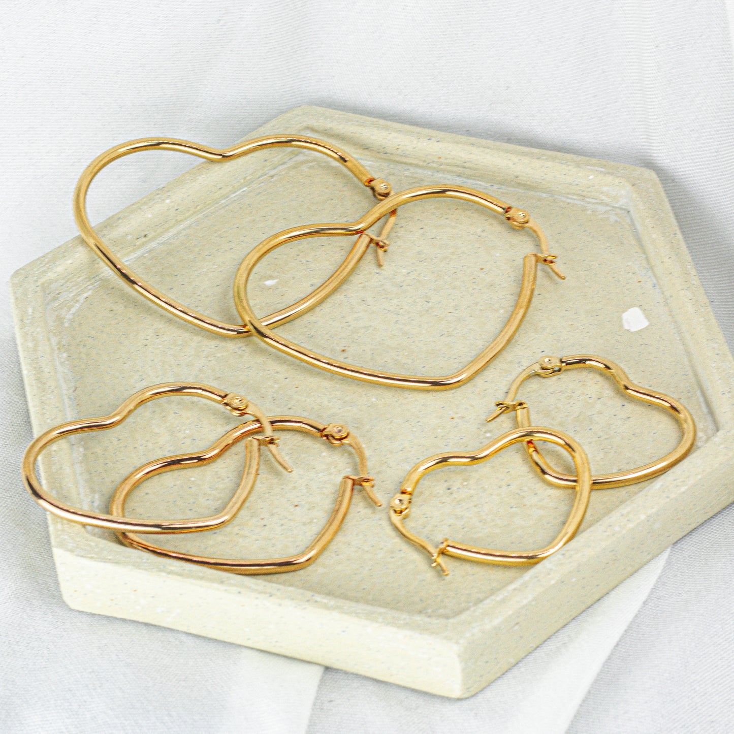 Argollas Corazón en Acero Dorado