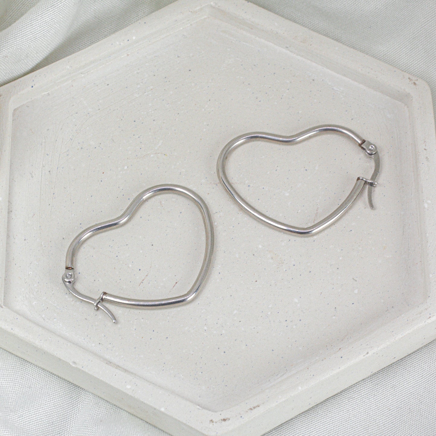 Argollas Corazón en Acero Plateado