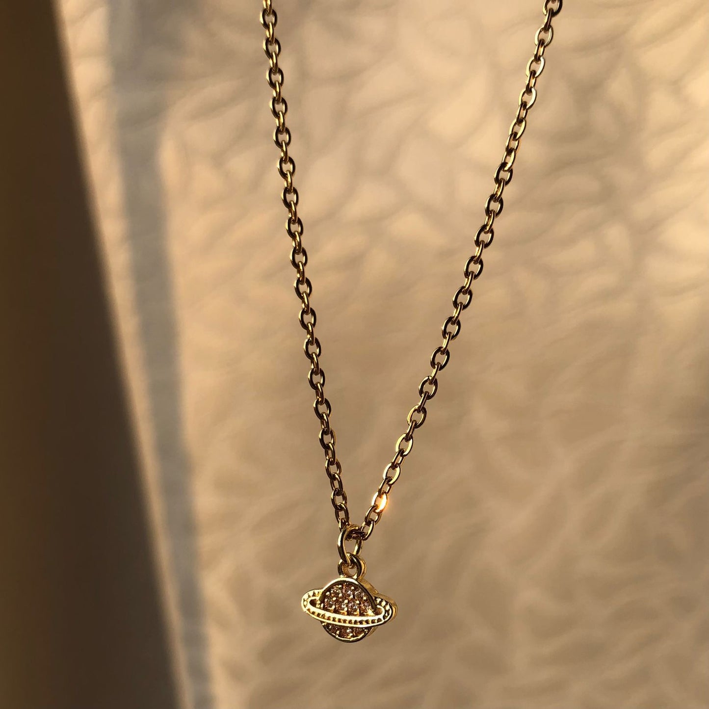 Collar Bling Saturno Petit en Acero Dorado